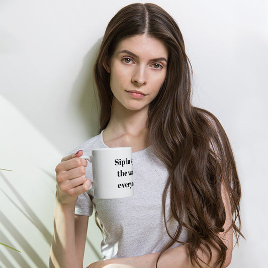"Sip in style, feel the warmth of every moment" Black Glossy Mug
